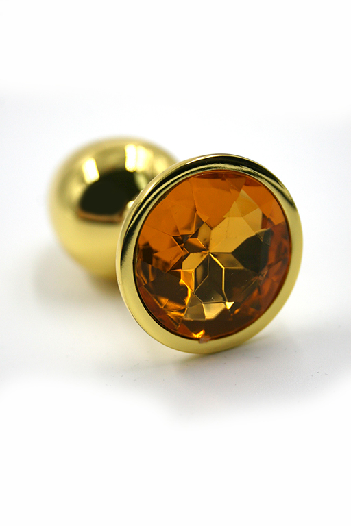 Золотистая анальная пробка с ярко-оранжевым кристаллом (Small)